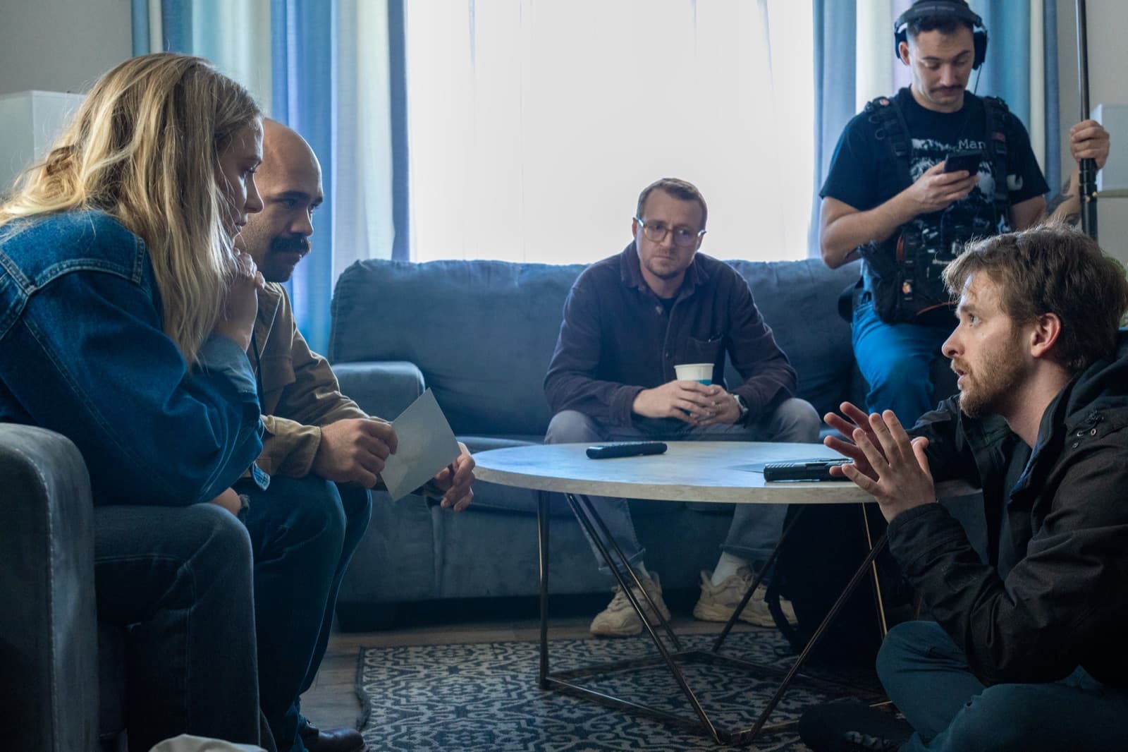 Alex Geffen discussing the living room scene