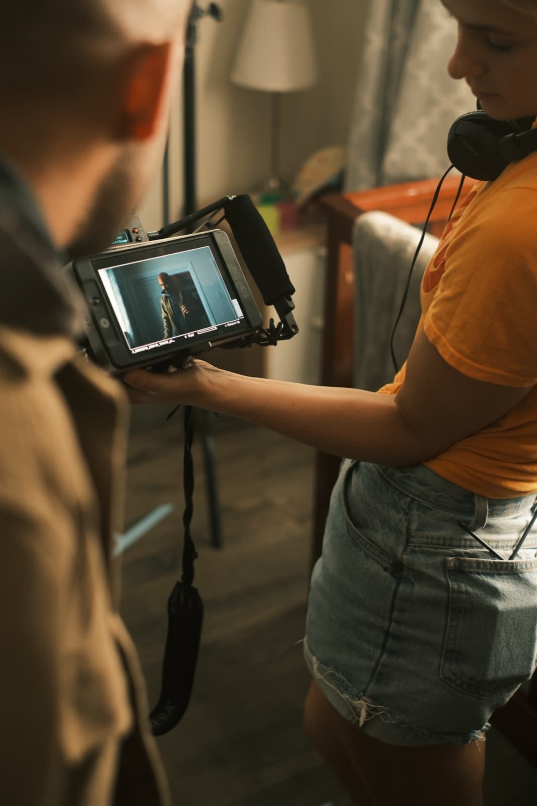 Cass Huckabay and Michael Cunningham reviewing playback