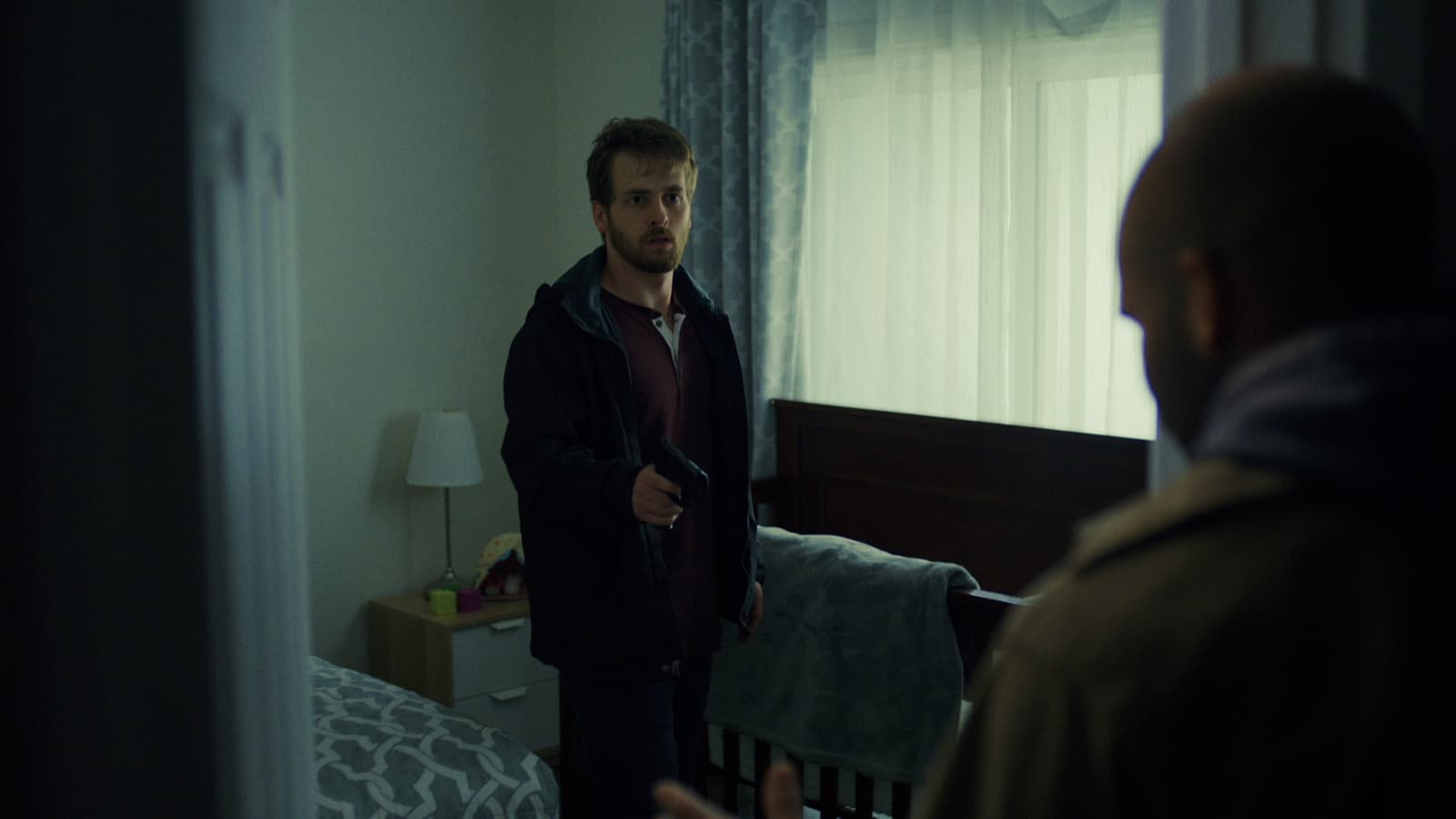 Trevor finding Mackenzie in the crib